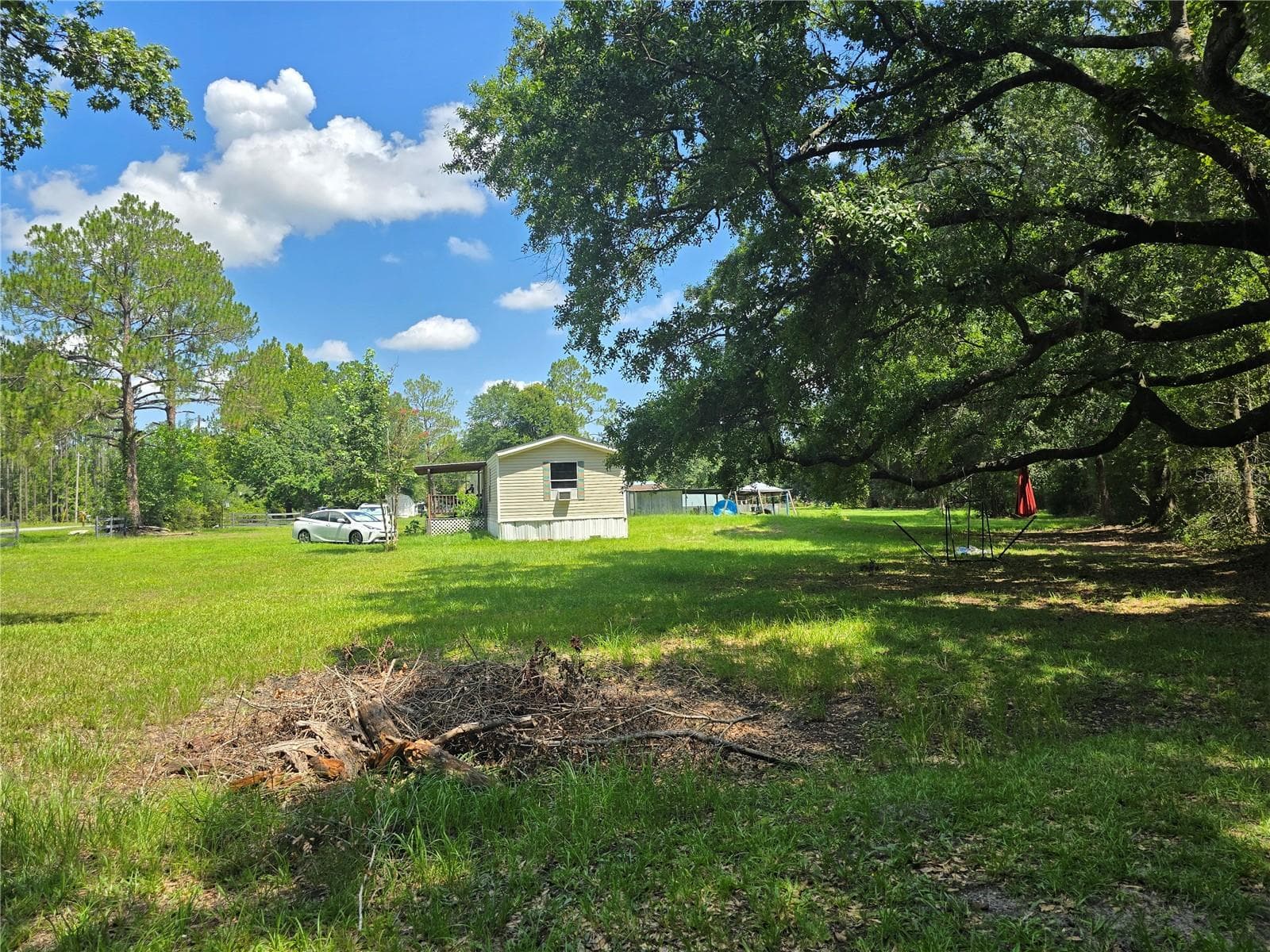 Manufactured Home at 11693 NW COUNTY ROAD 229, LAKE BUTLER, photo 3 of 29