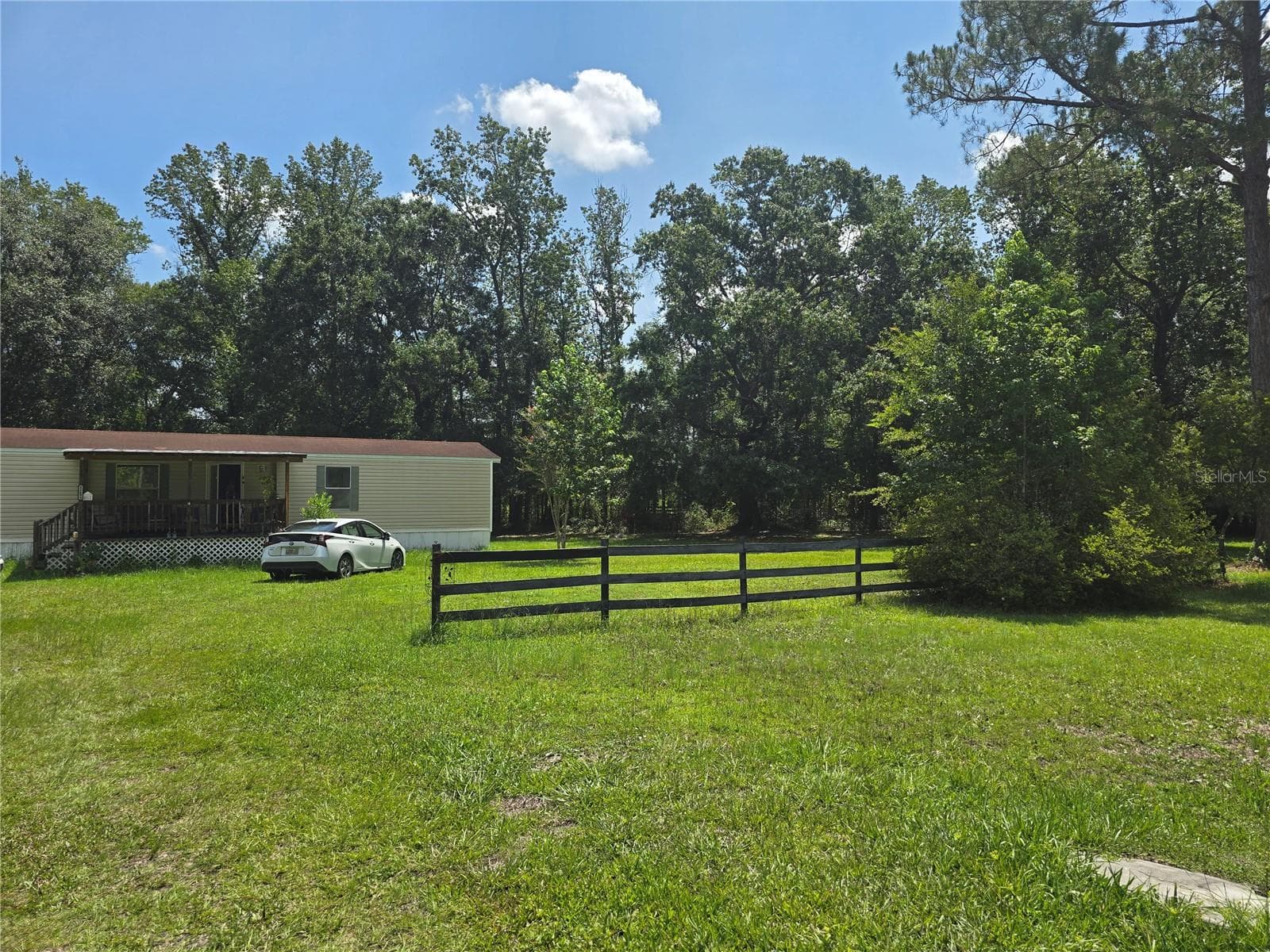 Manufactured Home at 11693 NW COUNTY ROAD 229, LAKE BUTLER, photo 5 of 29
