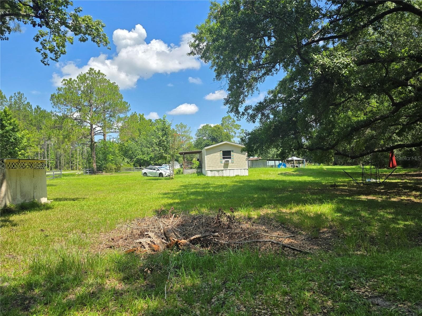 Manufactured Home at 11693 NW COUNTY ROAD 229, LAKE BUTLER, photo 6 of 29