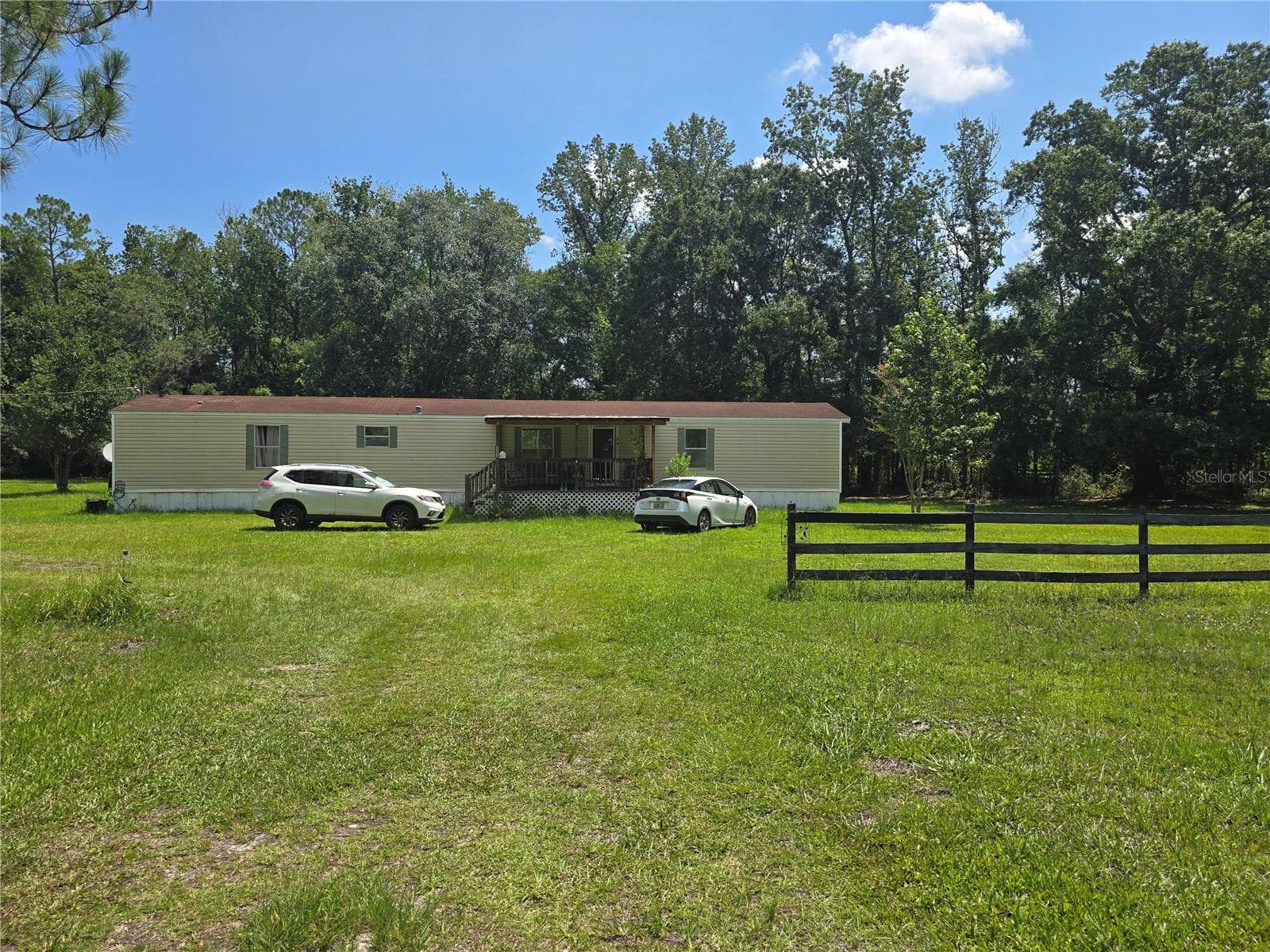 Manufactured Home at 11693 NW COUNTY ROAD 229, LAKE BUTLER, photo 9 of 29