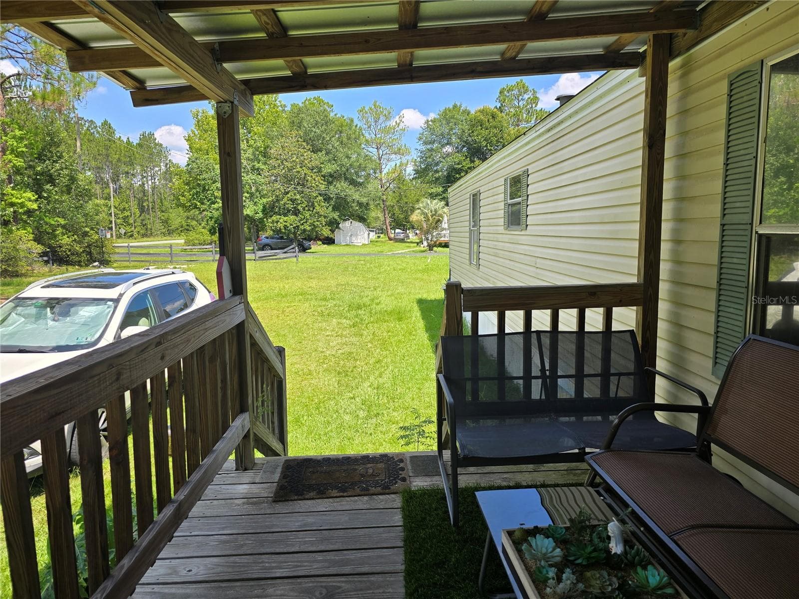 Manufactured Home at 11693 NW COUNTY ROAD 229, LAKE BUTLER, photo 18 of 29