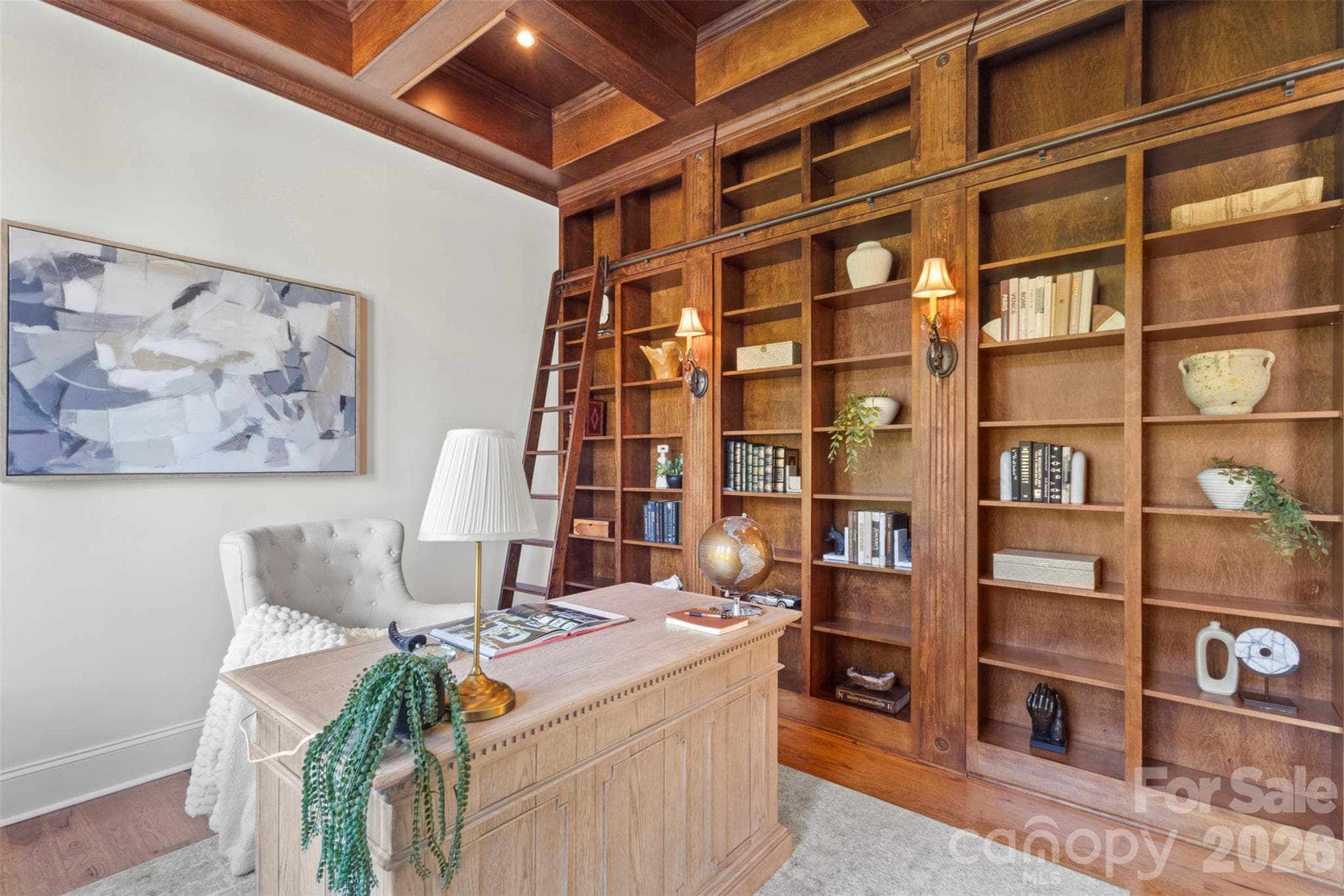Custom built in bookcase with ladder provides space for all your books and treasures - 973 Pinnacle Drive, Iron Station
