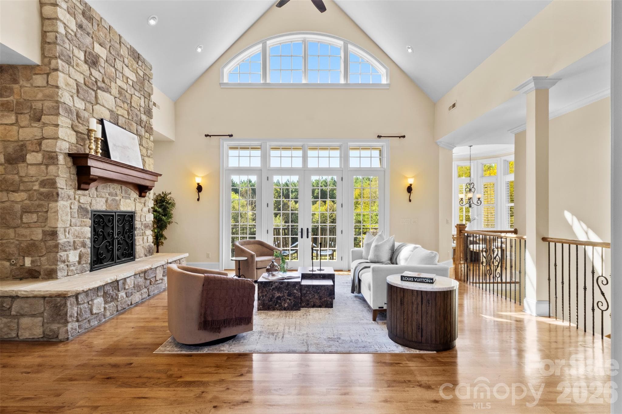 Vaulted ceiling in the great room allows your eye to naturally be drawn to the french doors overlooking the estate - 973 Pinnacle Drive, Iron Station