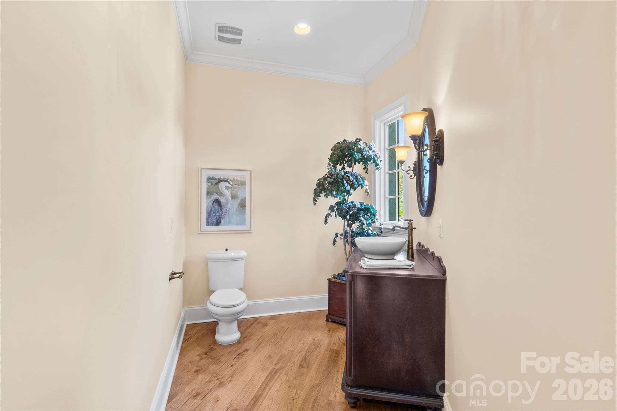 Main level powder room - 973 Pinnacle Drive, Iron Station
