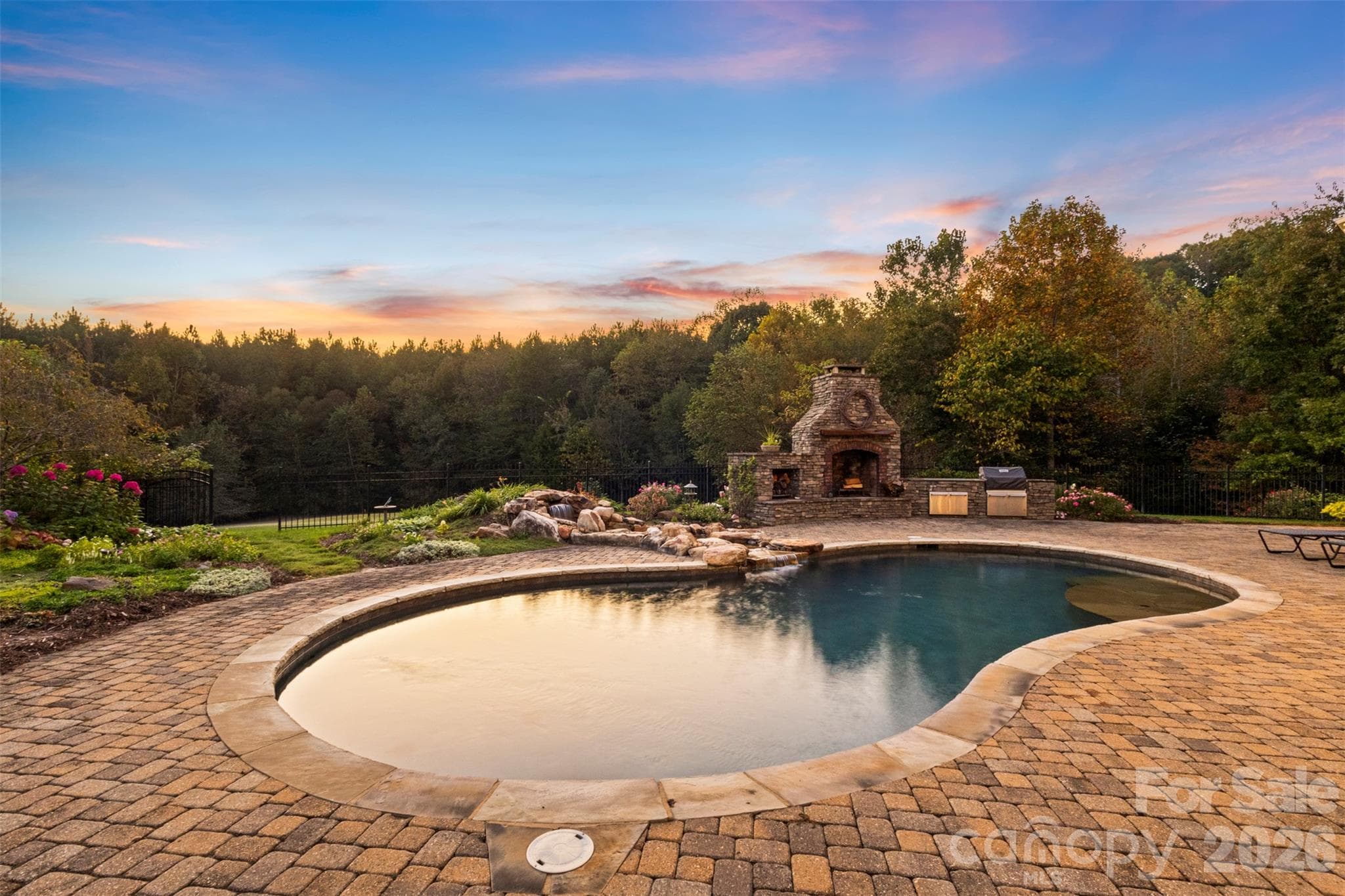 Golden hour does not disappoint poolside - 973 Pinnacle Drive, Iron Station