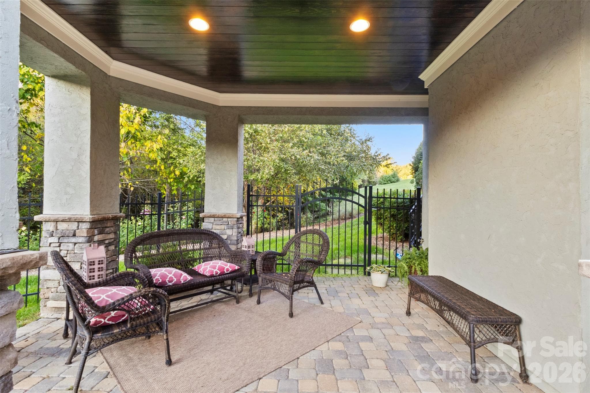 Covered porch on the lower level - 973 Pinnacle Drive, Iron Station