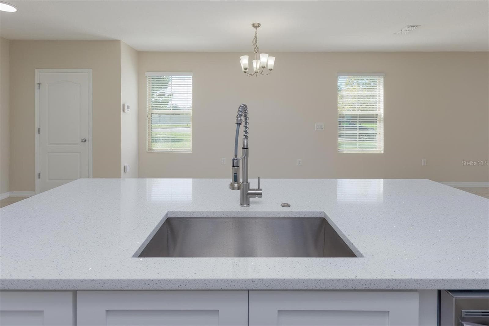 Island and living-area perspective - 1485 RYLEE ROCK WAY, KISSIMMEE