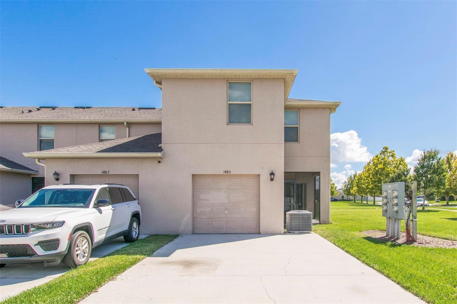 Rear-entry garage exterior - 1485 RYLEE ROCK WAY, KISSIMMEE