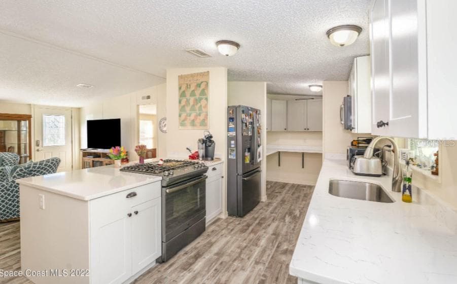 Manufactured Home at 4230 APRIL LN, MIMS, photo 5 of 13