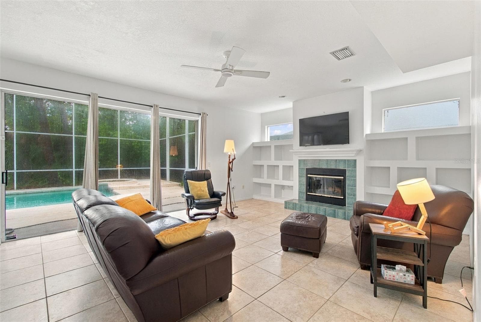 Family Room with Focal Fireplace - 8102 STONEFIELD, TAMPA