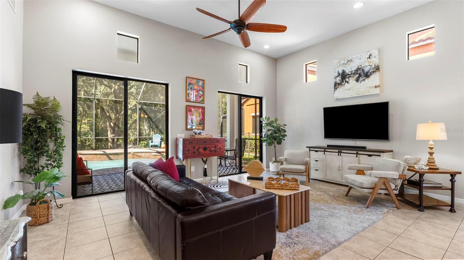 Living Room-Dual Sliding Glass Doors - 20316 HERITAGE POINT DR, TAMPA