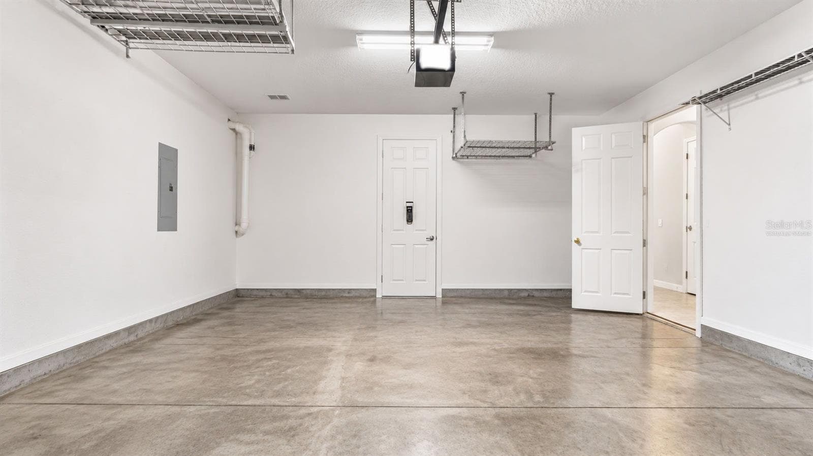 Virtually Staged-Garage-Upper Storage Throughout - 20316 HERITAGE POINT DR, TAMPA