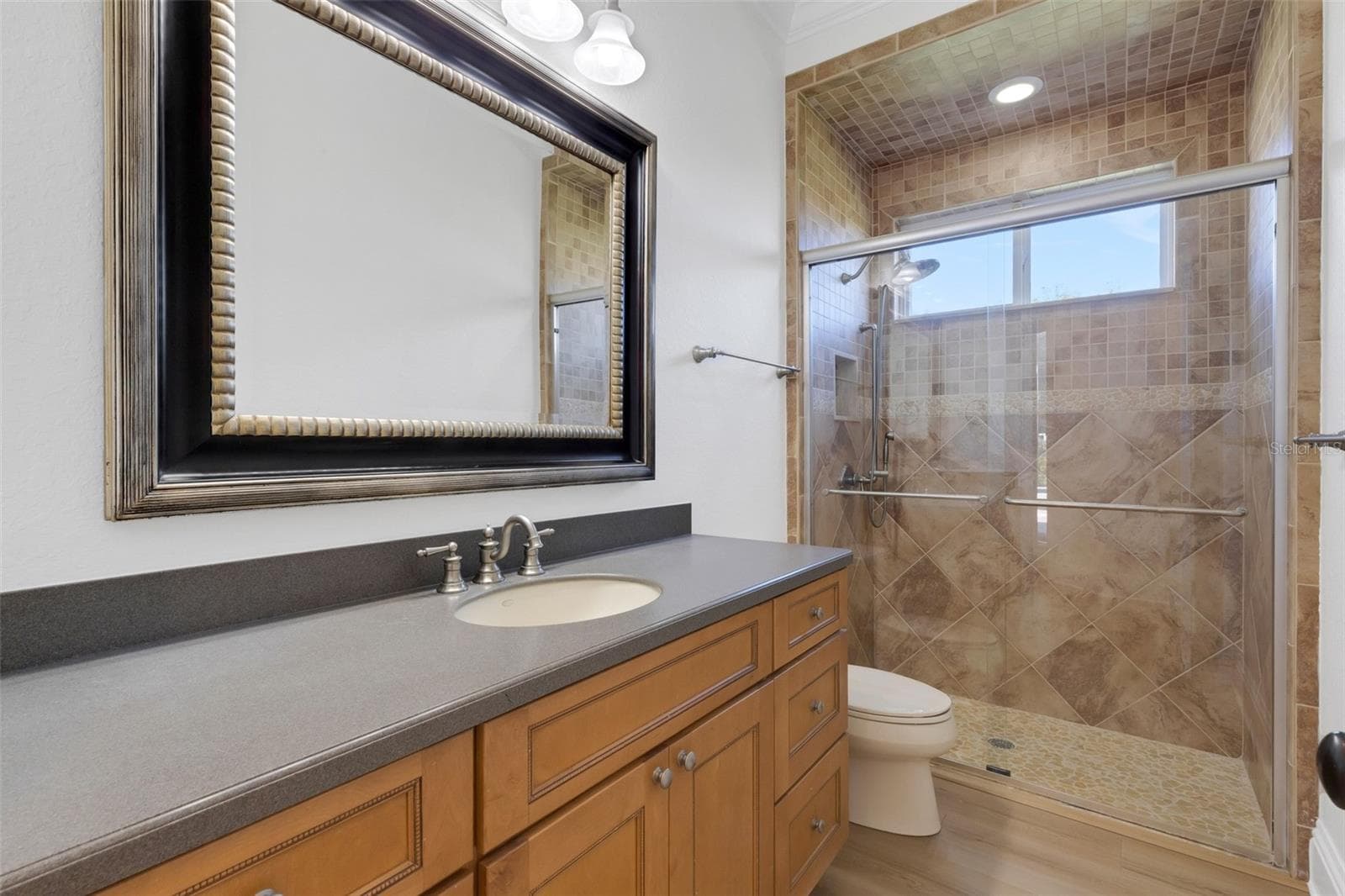 And bathroom #3 is directly adjacent and does double duty as your pool bath. - 6562 EAGLE VIEW LOOP, LAKELAND