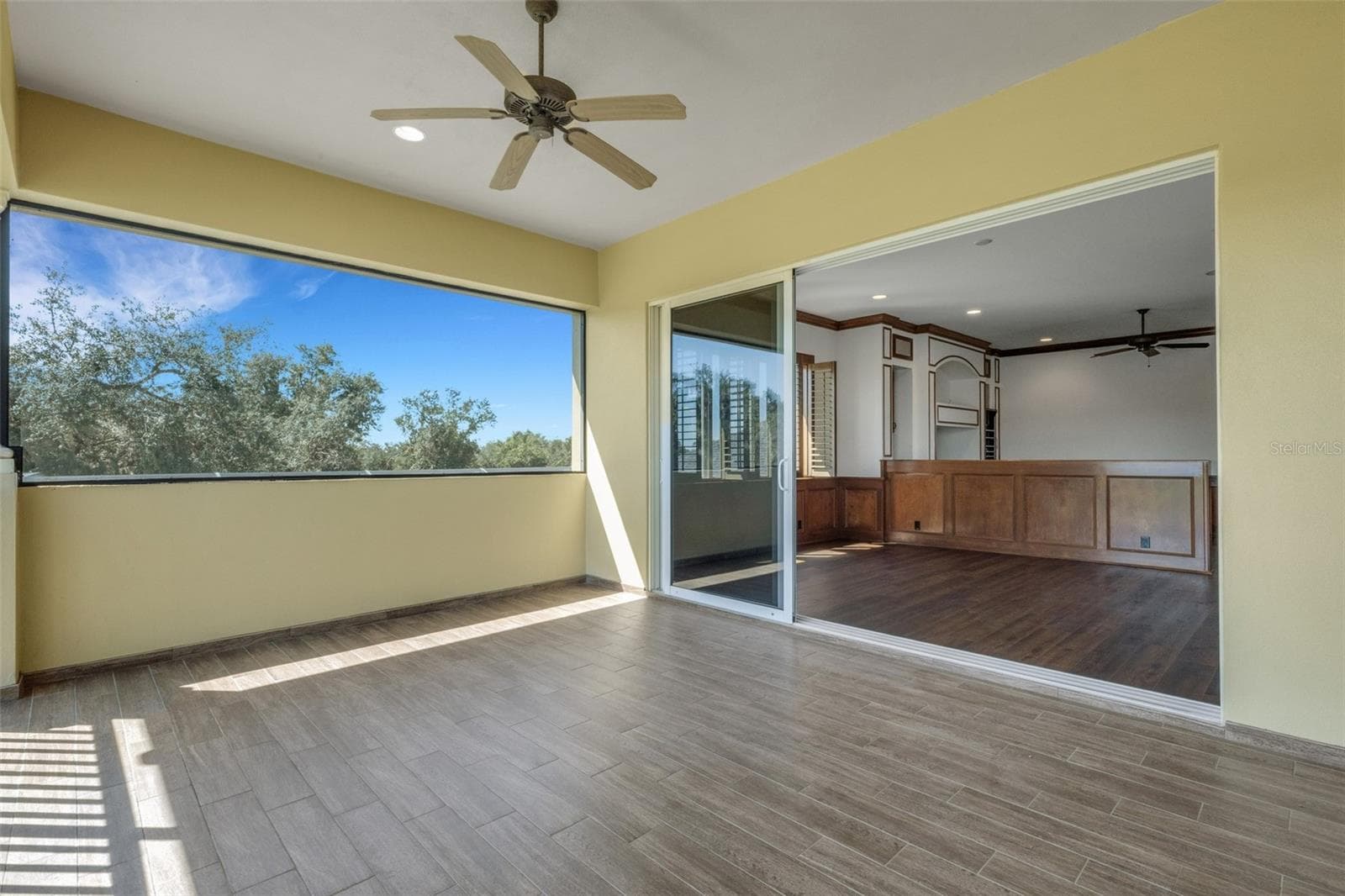The wood-look tile flooring is easy to maintain going forward. - 6562 EAGLE VIEW LOOP, LAKELAND