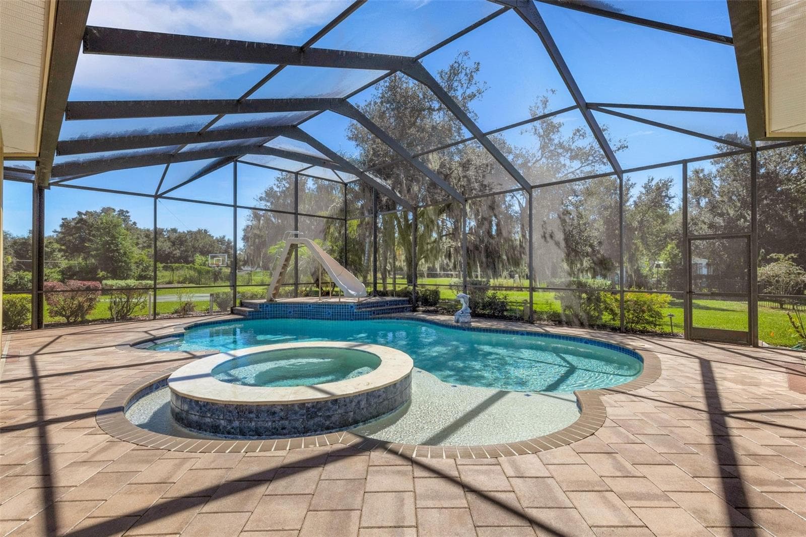 The oversized pool area has it all . . . - 6562 EAGLE VIEW LOOP, LAKELAND