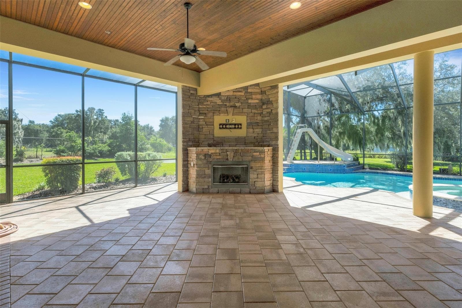 And, with the cooler weather approaching you can gather around the gas fireplace and have your own sports watch party simply with the addition of a TV above the fireplace. - 6562 EAGLE VIEW LOOP, LAKELAND