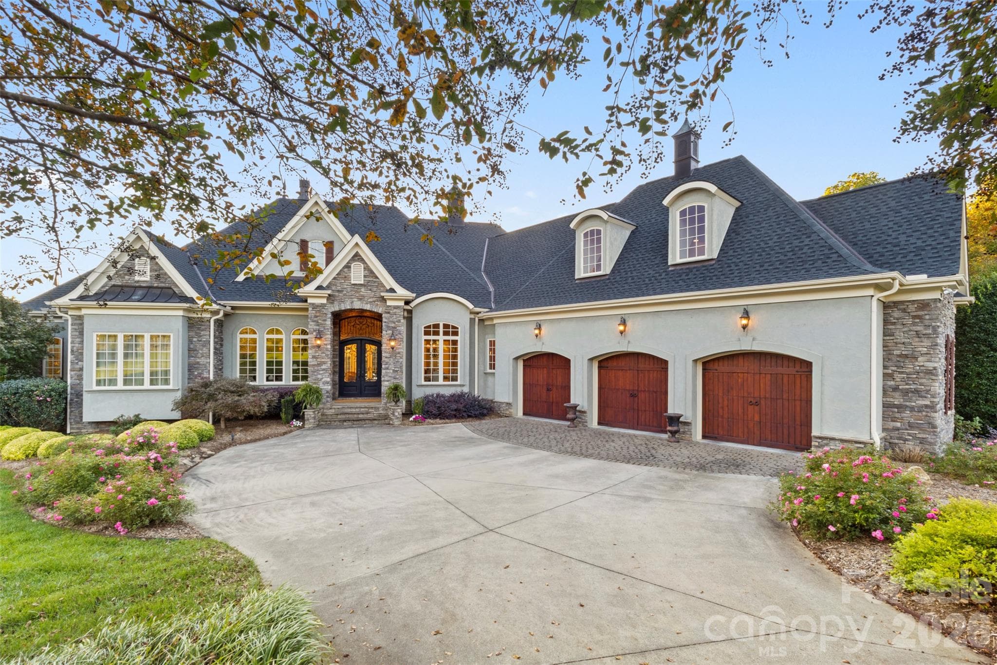 Gorgeous curb appeal, tucked into the lot for additional privacy - 973 Pinnacle Drive, Iron Station