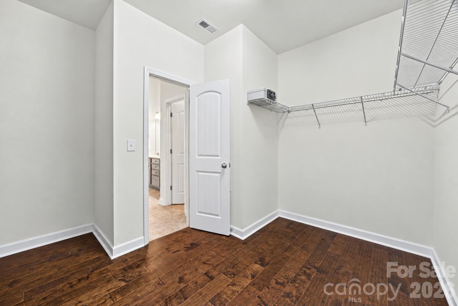 Primary walk-in closet - 8720 Artesa Mill Lane, Charlotte
