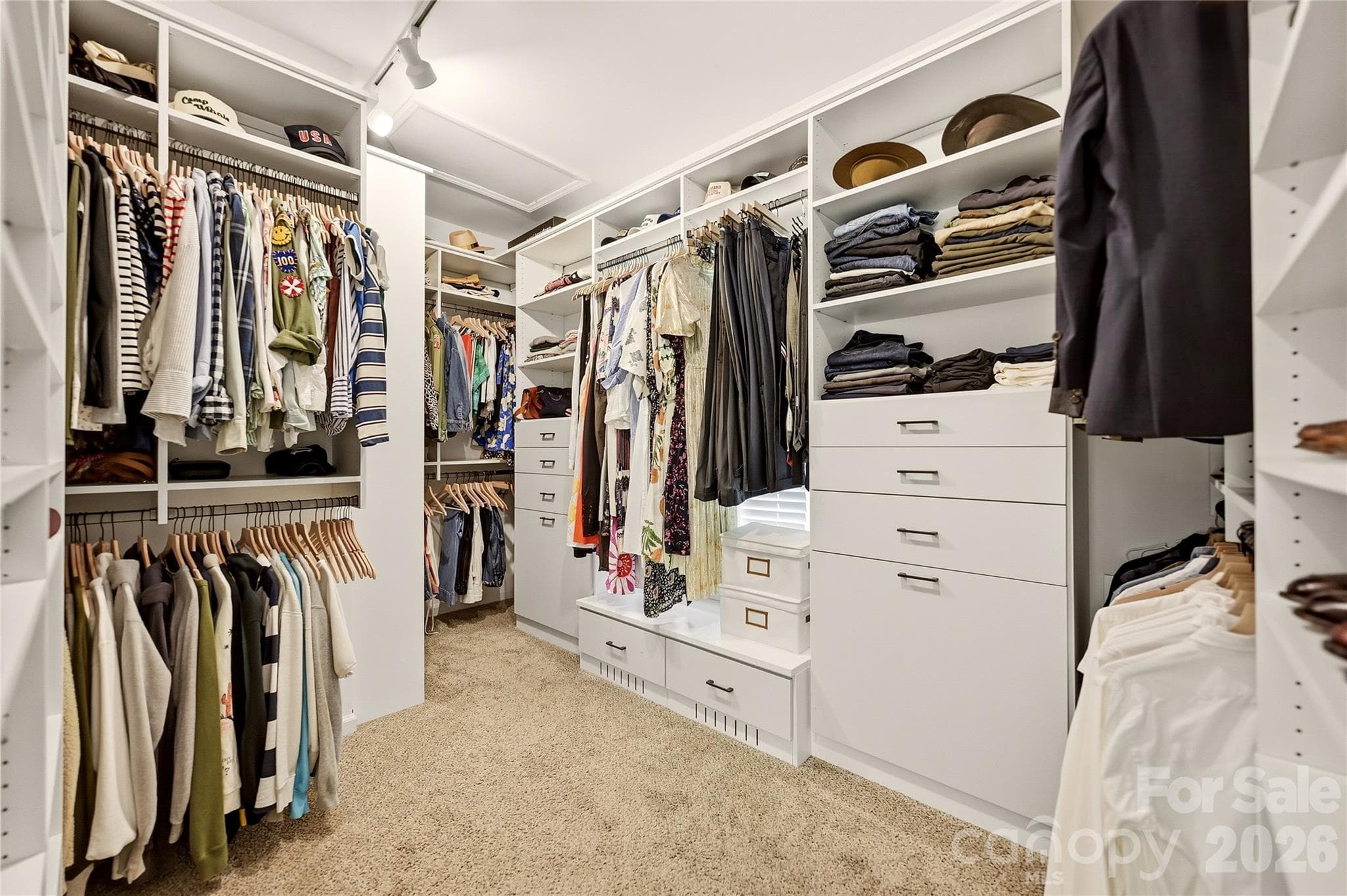 Large primary custom closet - 16521 Plantation Woods Drive, Charlotte