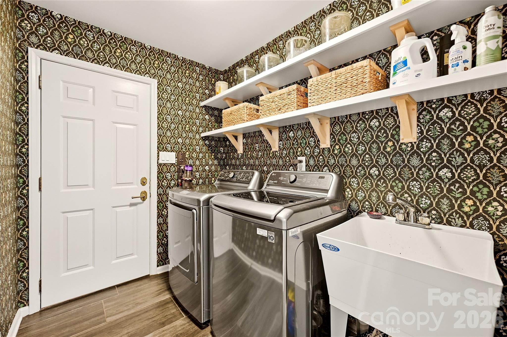Laundry room on the main - 16521 Plantation Woods Drive, Charlotte
