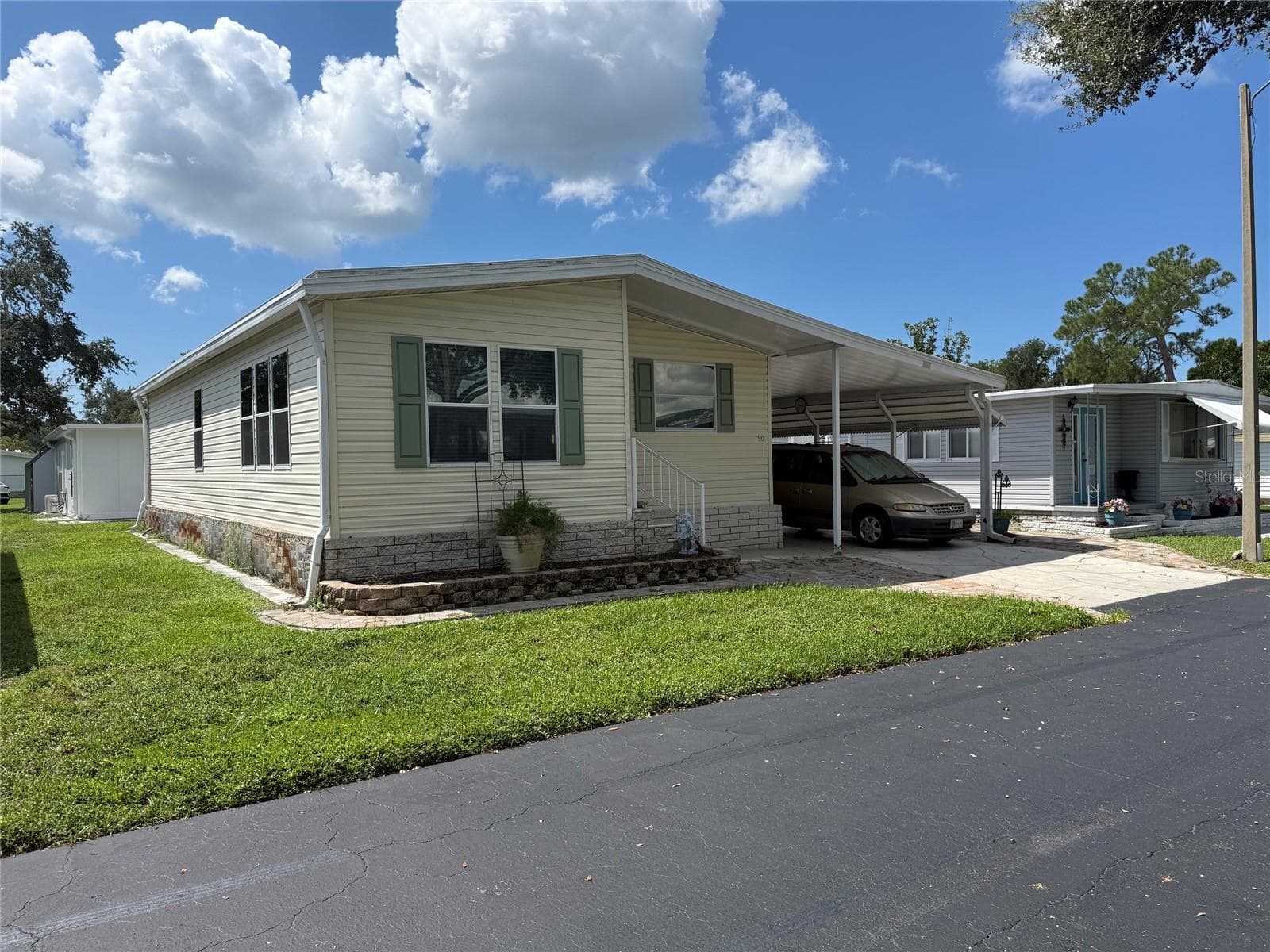 Manufactured Home at 7880 54TH AVE N #102, ST PETERSBURG, photo 3 of 43