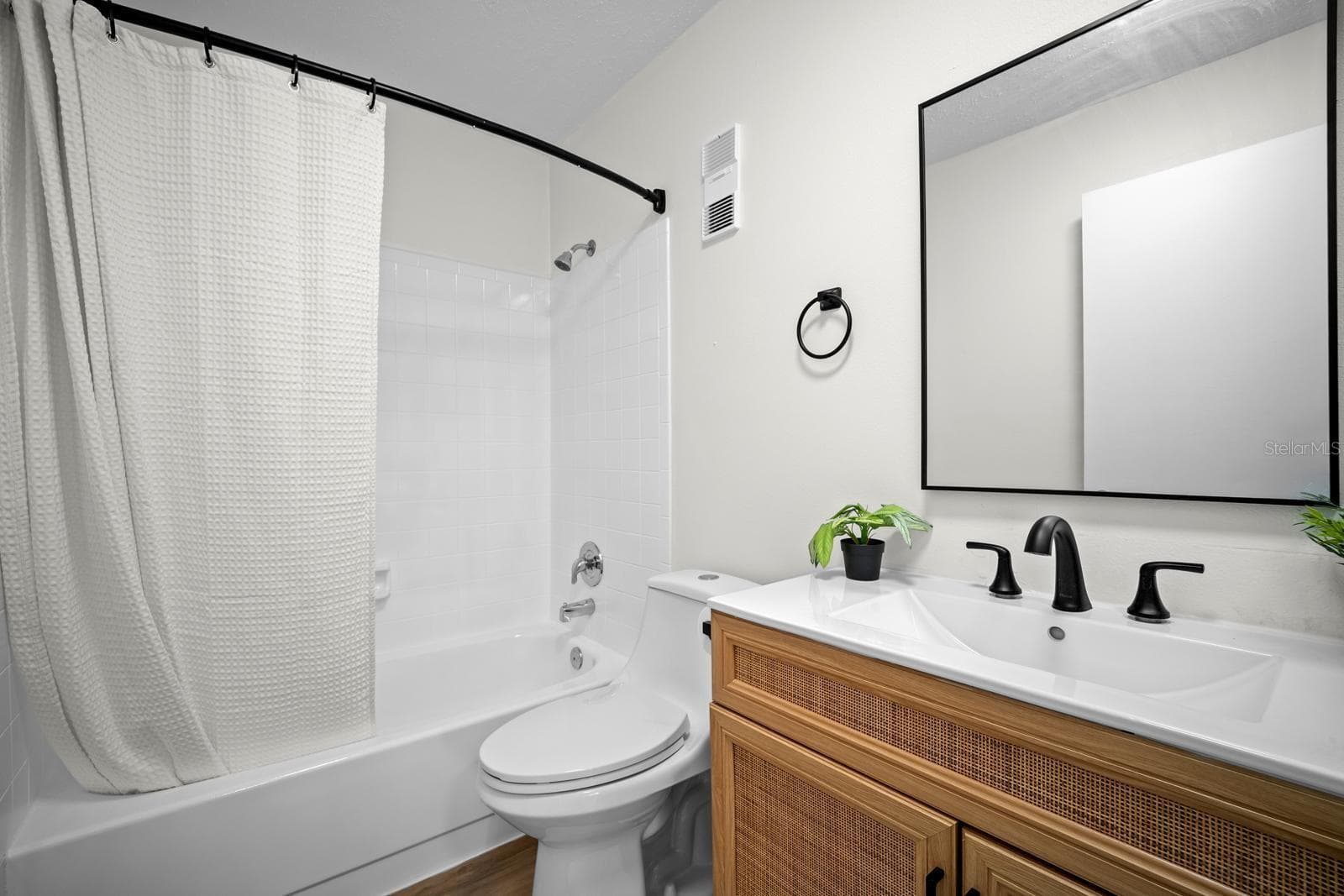 bathroom with tub - 2922 LICHEN LN #A, CLEARWATER