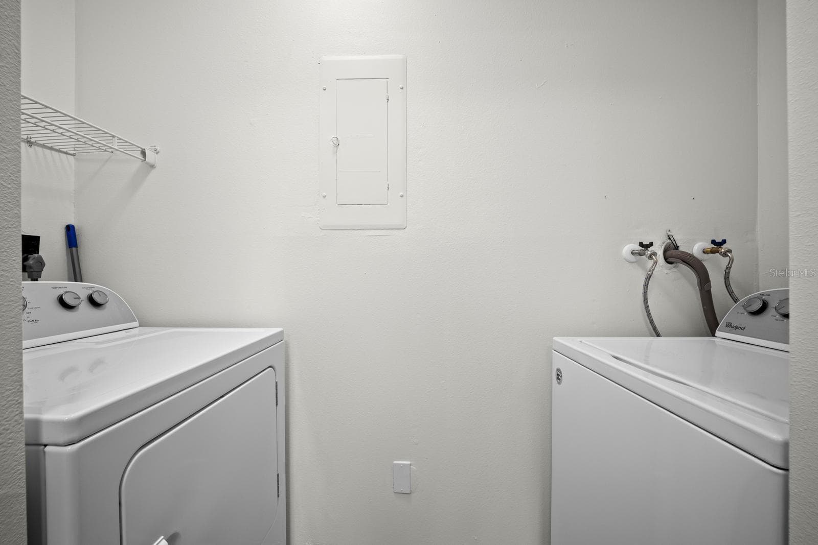 in door laundry area in the kitchen - 2922 LICHEN LN #A, CLEARWATER