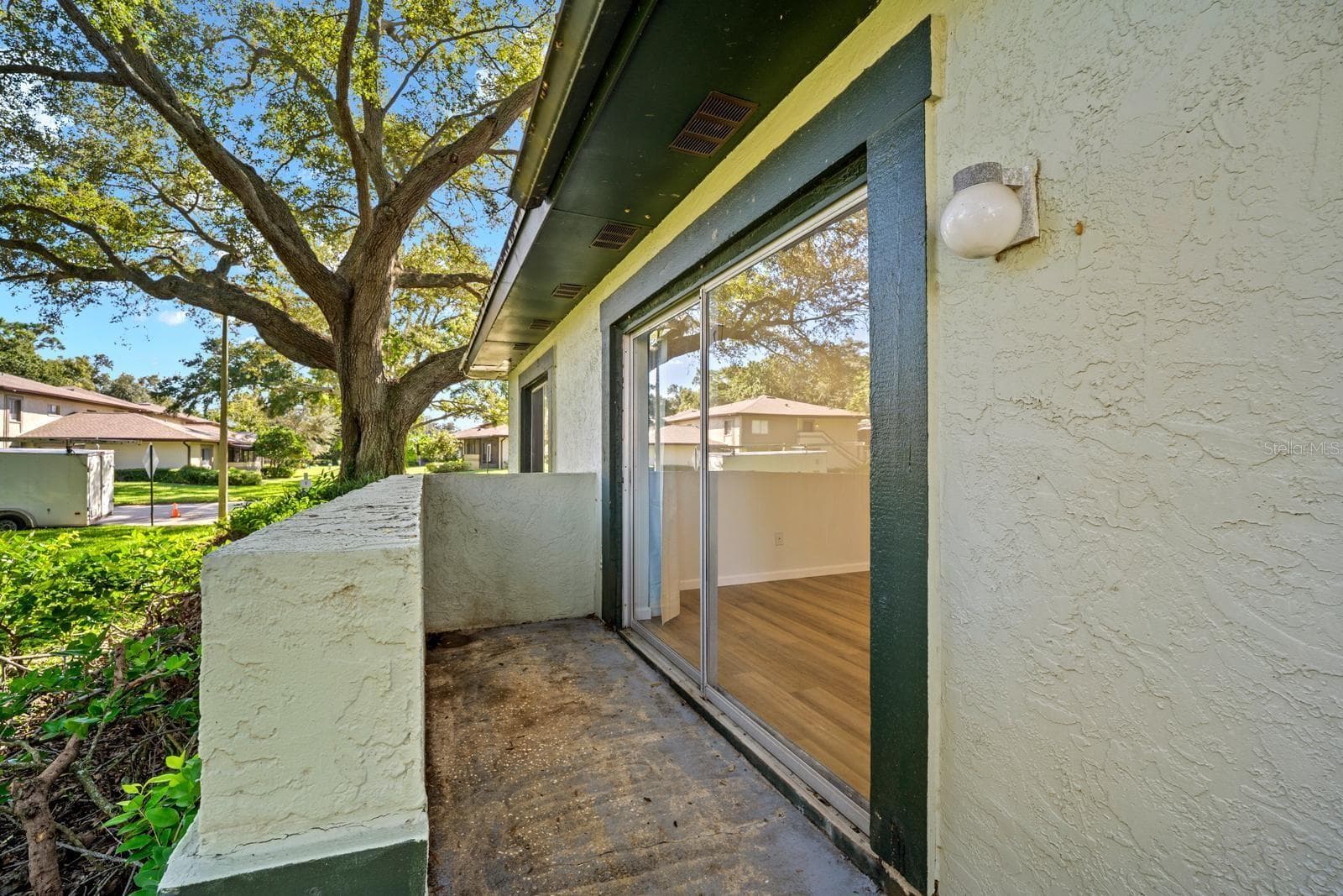 patio with view of the pool - 2922 LICHEN LN #A, CLEARWATER