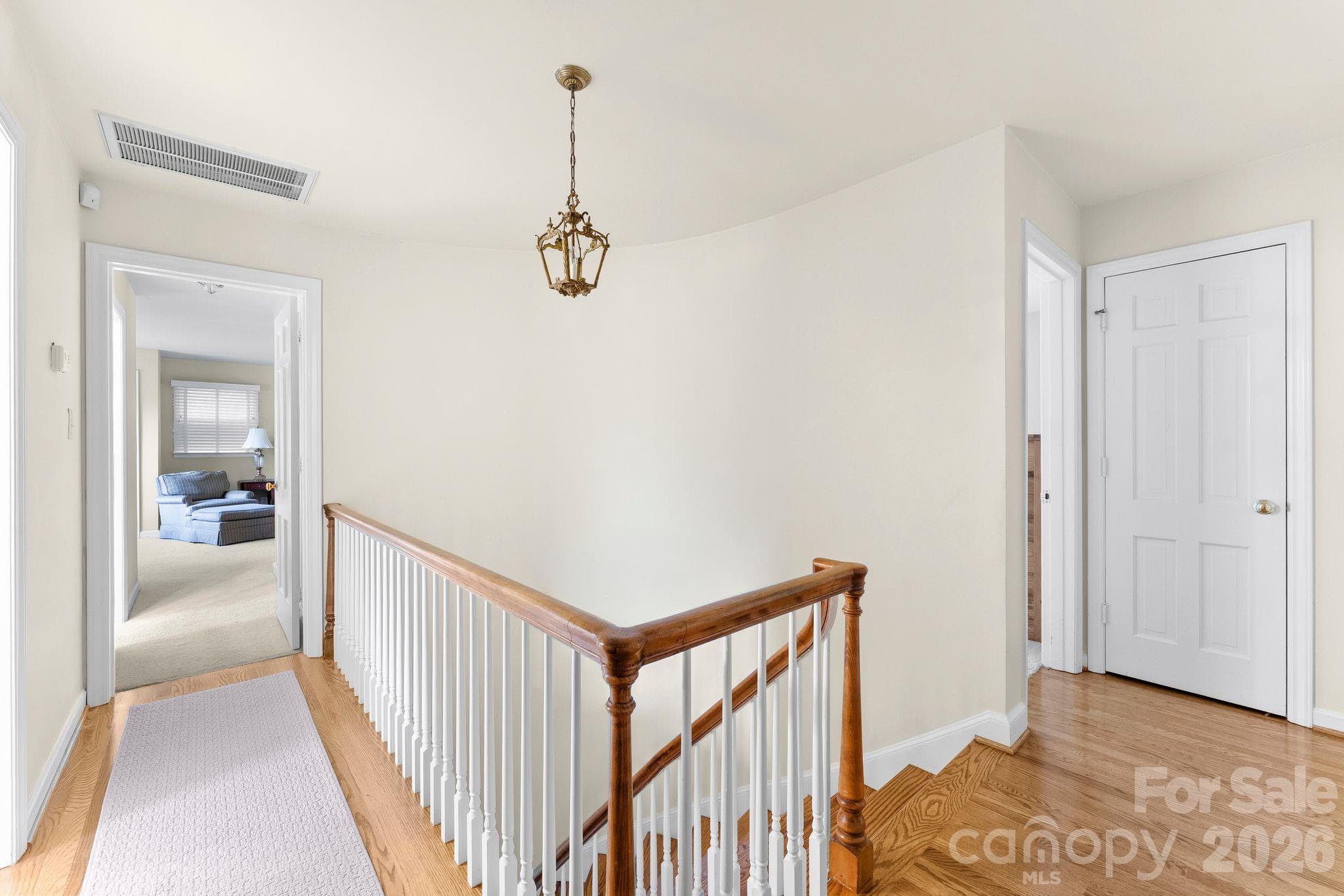 Upstairs landing with hardwood floors - 2006 Grey Road, Davidson