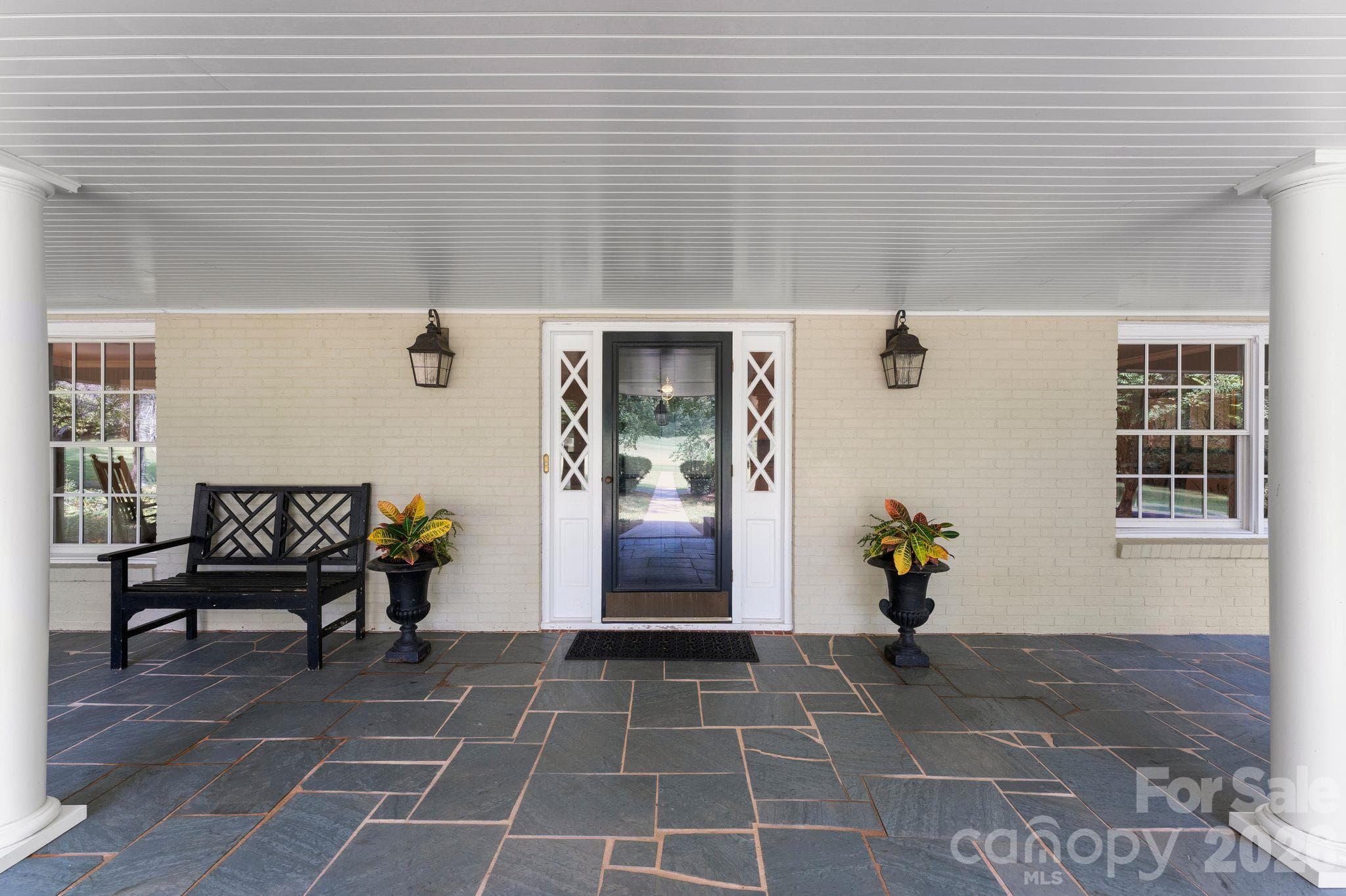 Wide covered front porch welcomes you - 2006 Grey Road, Davidson