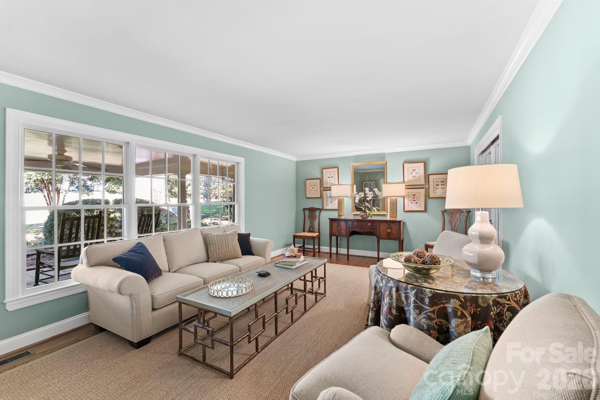 Formal living room with a bay window overlooking the front porch - 2006 Grey Road, Davidson