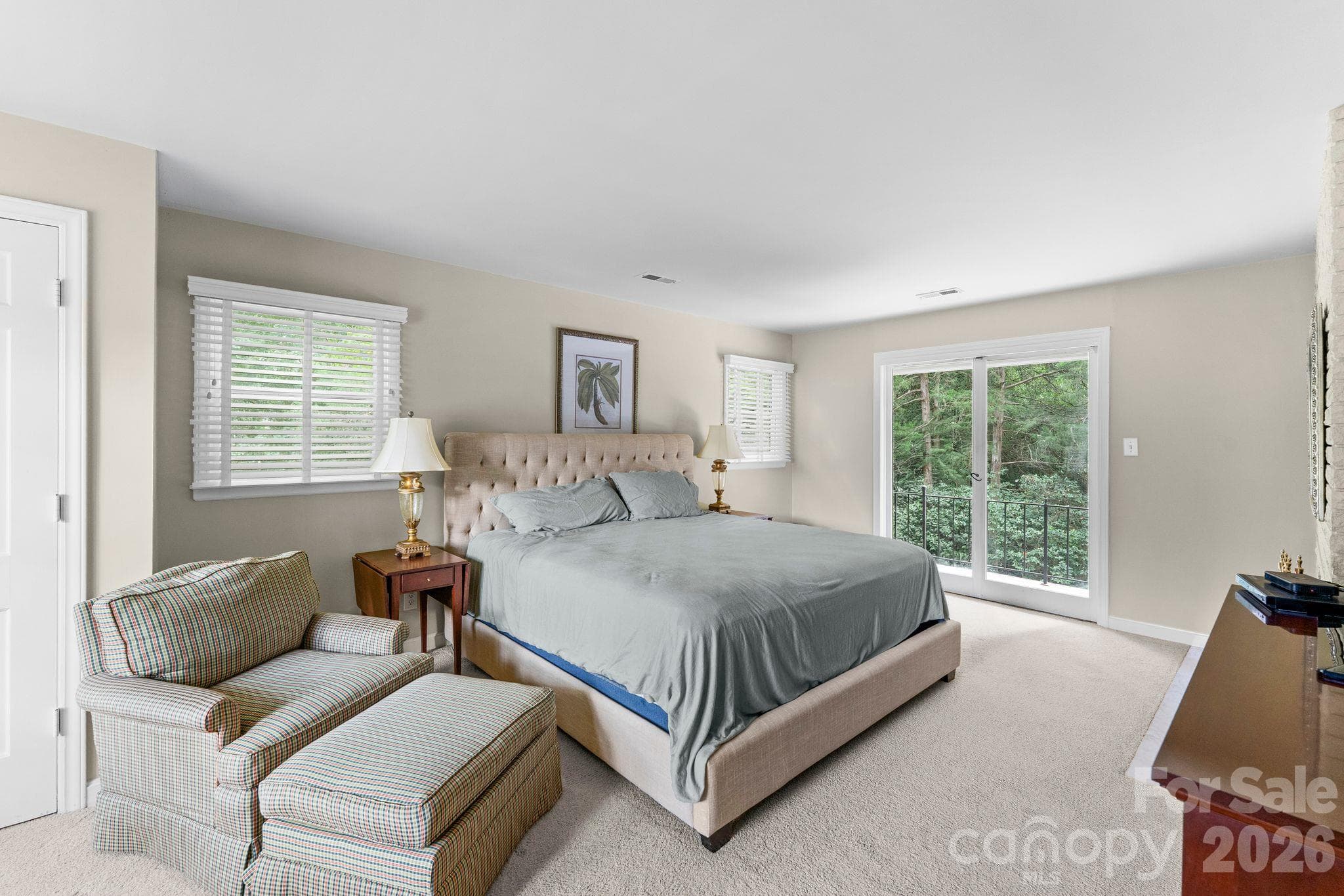 Sliding glass doors to a balcony off the Primary Bedroom - 2006 Grey Road, Davidson