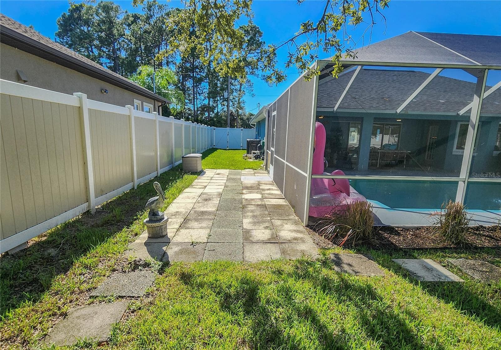 Other side with double gate - 118 FERNDALE LN, PALM COAST