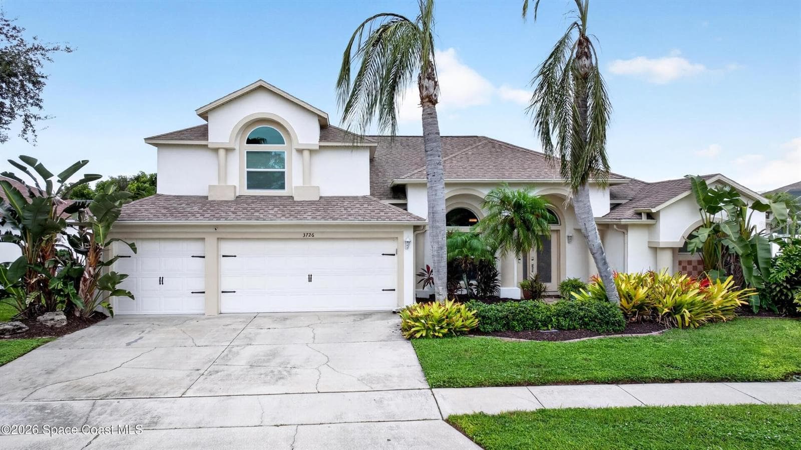 Classic curb appeal, 3 car garage - 3726 SUNWARD DR, MERRITT ISLAND
