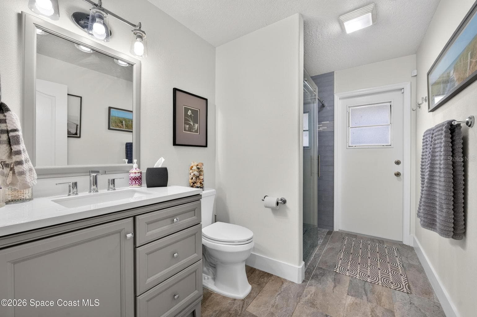 Pool bath with outdoor access - 3726 SUNWARD DR, MERRITT ISLAND