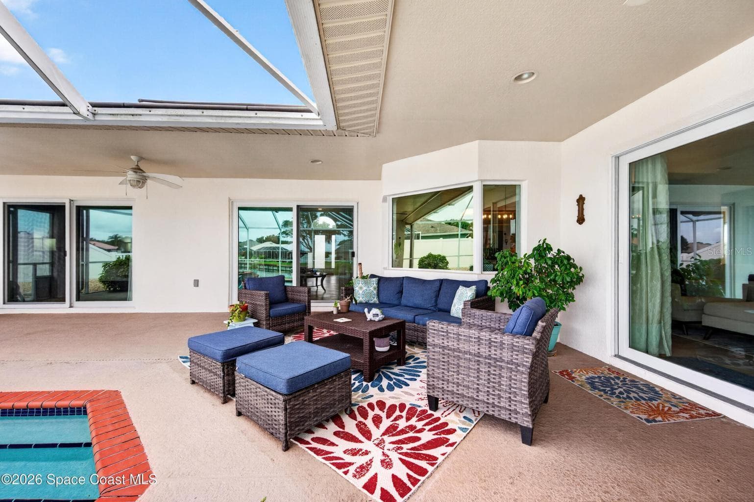 Lanai seating with spa and pool - 3726 SUNWARD DR, MERRITT ISLAND