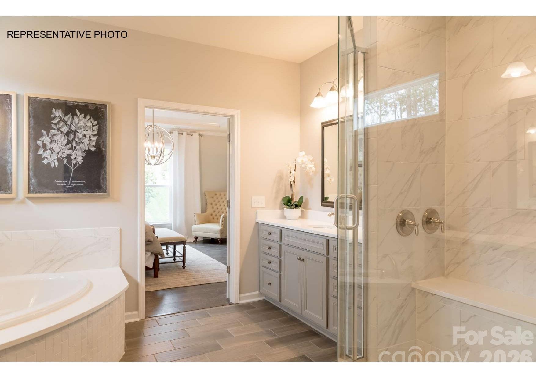 Incredibly-appointed owner's suite bathroom and HUGE walk-in closet! - 7689 Pedigree Circle, Lancaster
