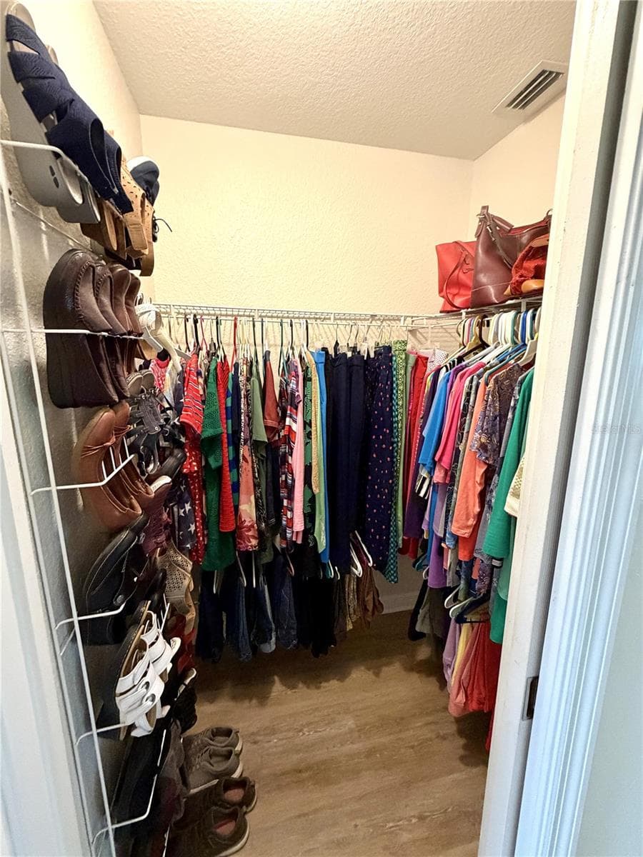 Primary Bedroom 1st walk-in closet - 23411 MULLINS AVE, PORT CHARLOTTE