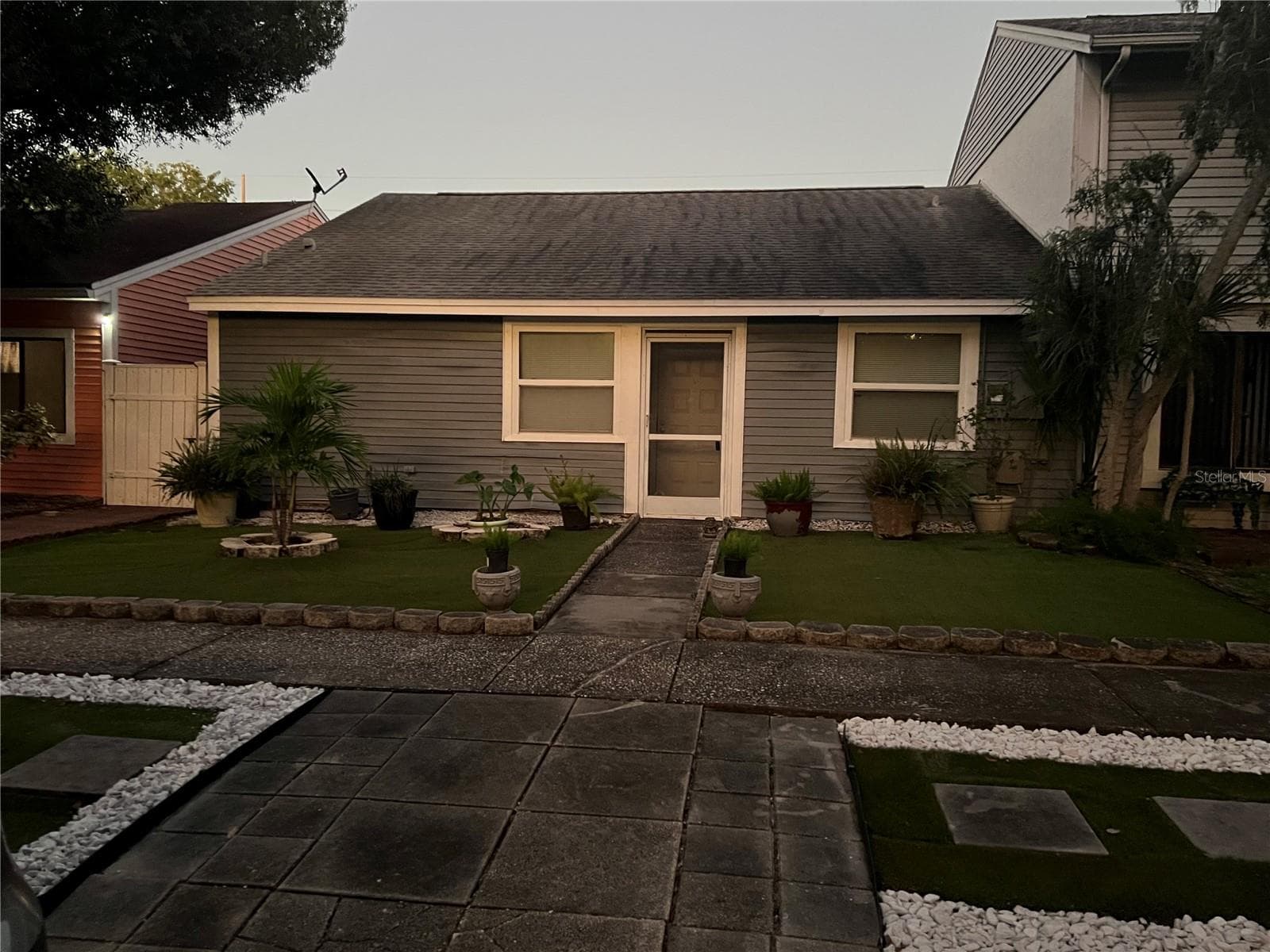 Front view at dusk - 4715 STONEPOINTE PL, TAMPA