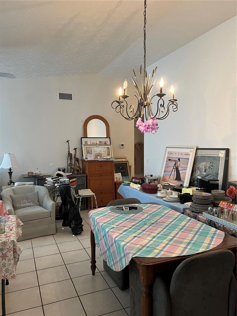 Look at high ceilings please and not the mess. - 4715 STONEPOINTE PL, TAMPA