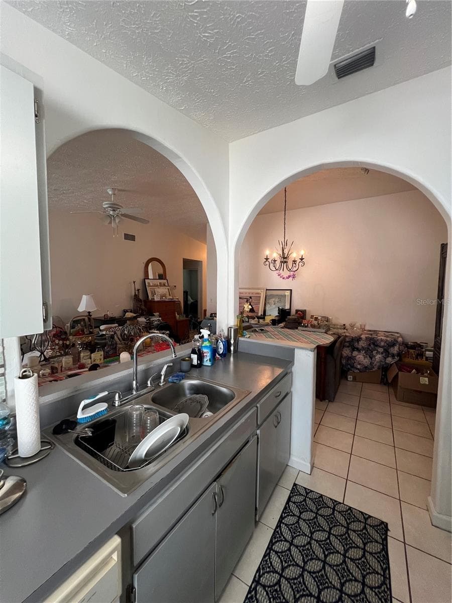 Kitchen out to LR and DR - 4715 STONEPOINTE PL, TAMPA