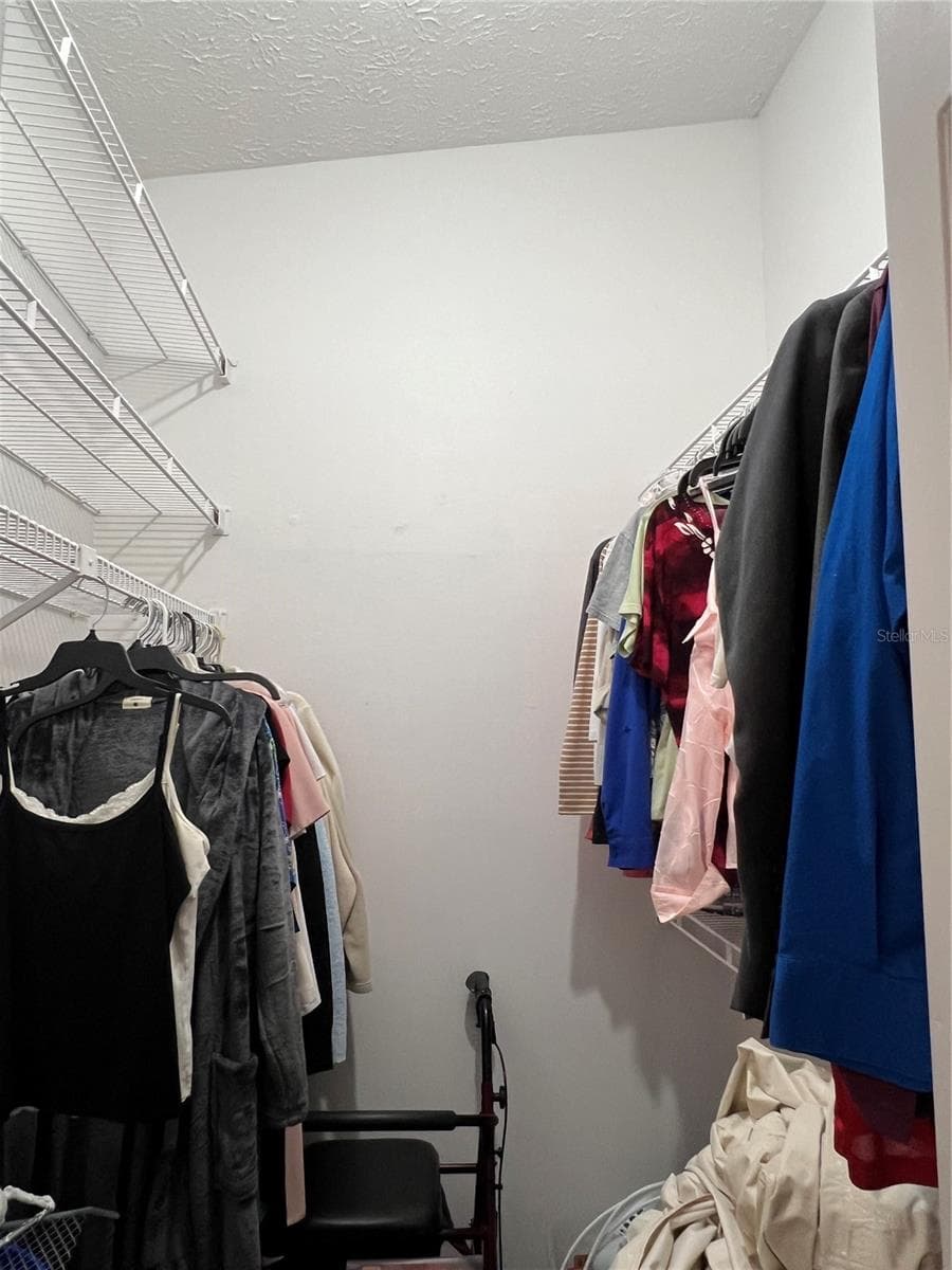 Primary closet - 4715 STONEPOINTE PL, TAMPA