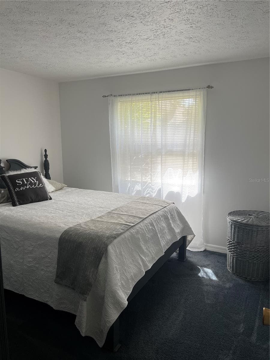 guest bed 1 - 4715 STONEPOINTE PL, TAMPA
