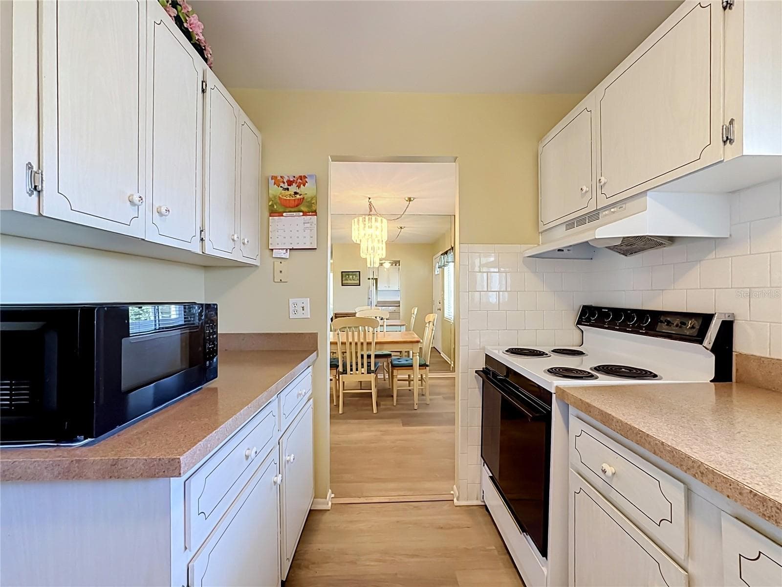Kitchen View Looking Toward Dinning Room - 5898 17TH ST W #C31, BRADENTON