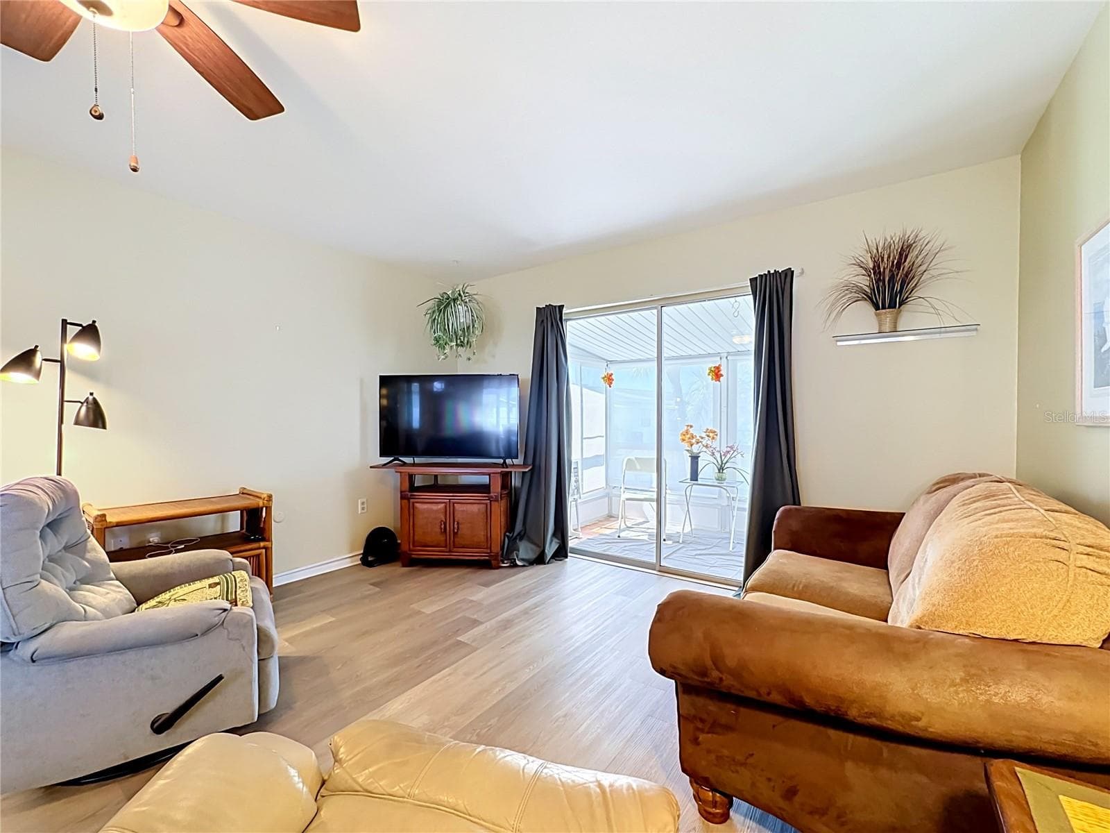 Living Room with Screened Patio View - 5898 17TH ST W #C31, BRADENTON
