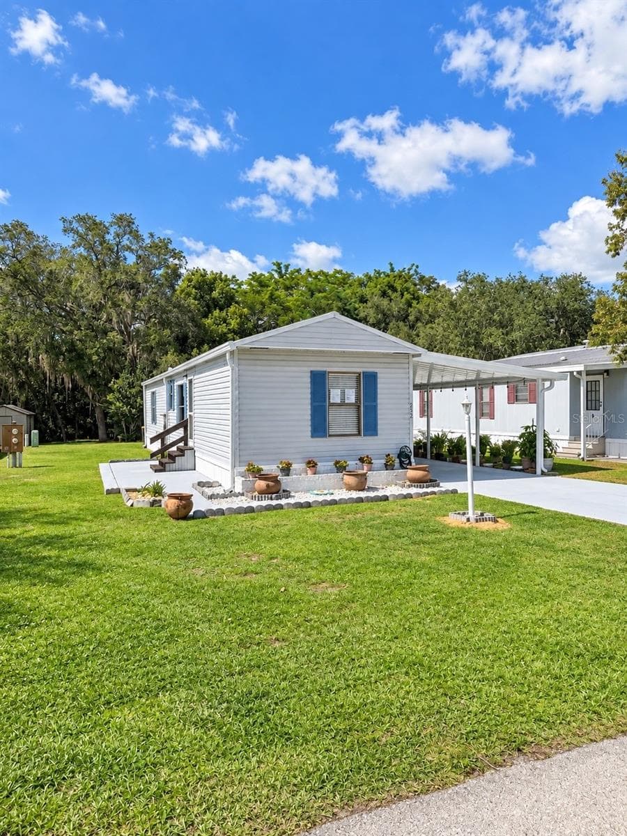 Manufactured Home at 232 S CAMPHOR LOOP, AVON PARK, photo 2 of 40