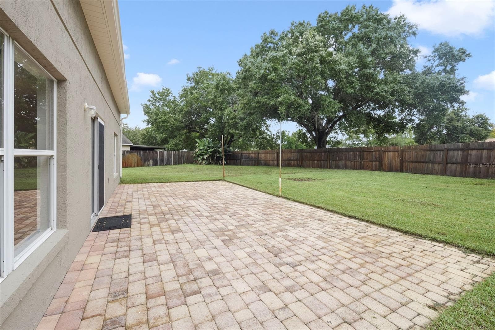Rear Paver patio - Image 1 - 4336 WILLOWCREST CT, ORLANDO