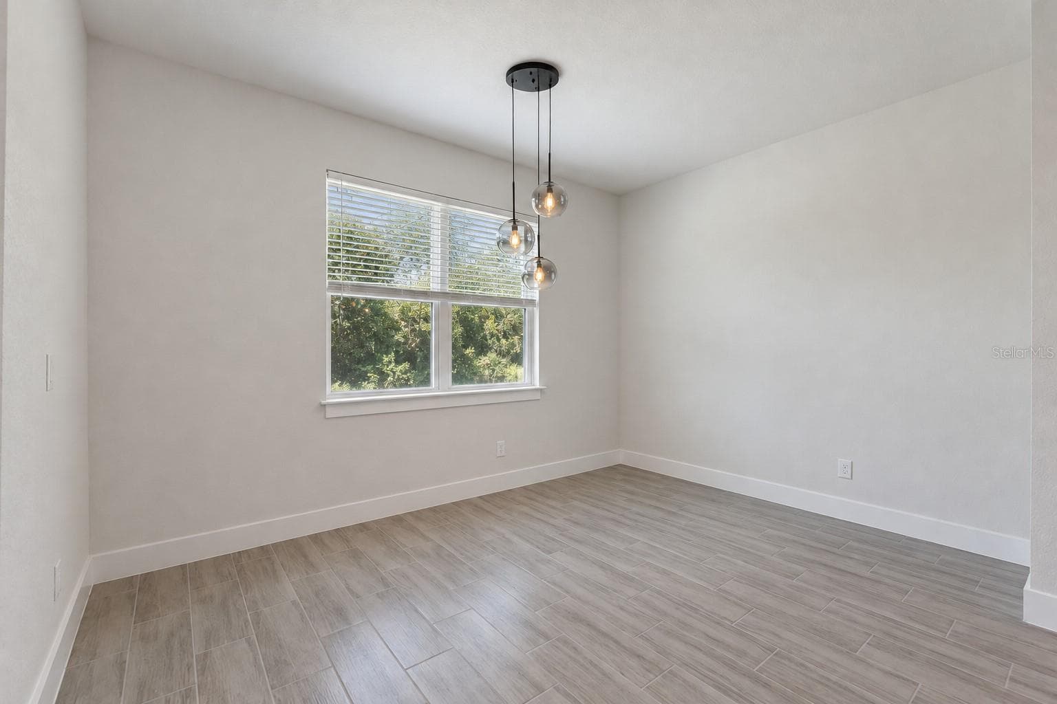 Dining area. Digitally edited model/property composite. - 24479 SW KINGSWAY CIR, ARCADIA