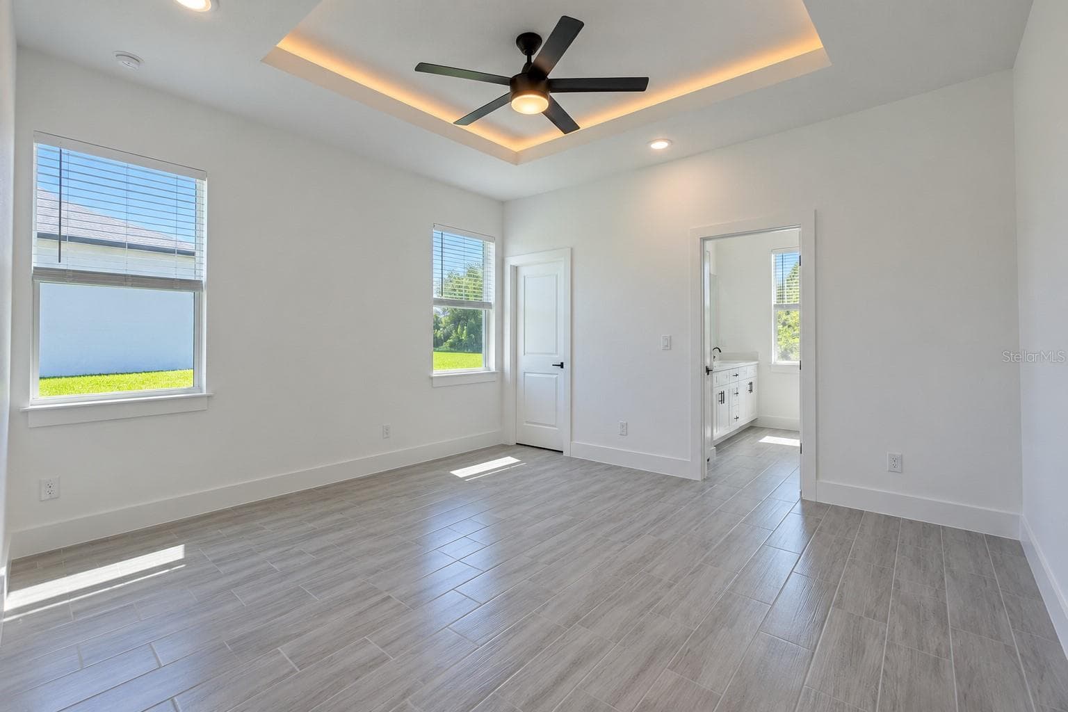 Primary bedroom. Digitally edited model/property composite. - 24479 SW KINGSWAY CIR, ARCADIA