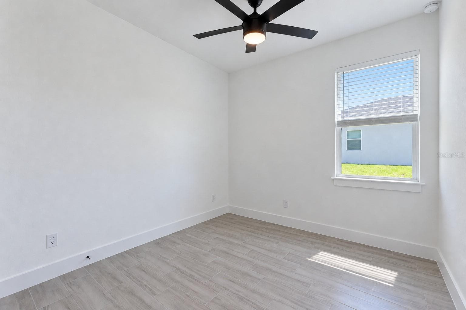 Bedroom three. Digitally edited model/property composite. - 24479 SW KINGSWAY CIR, ARCADIA